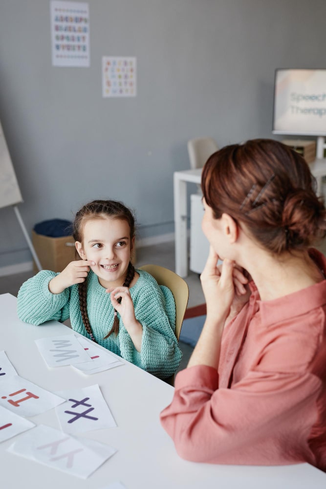 Child engaging in speech therapy session
